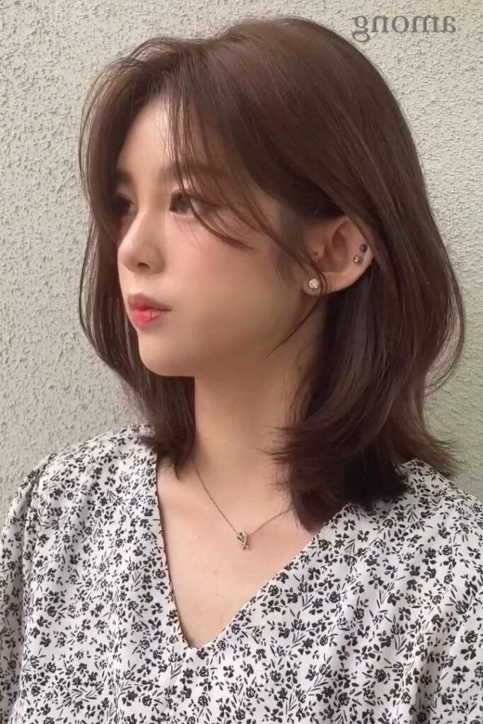 Chic Soft Layered Cut with Side-Swept Bangs