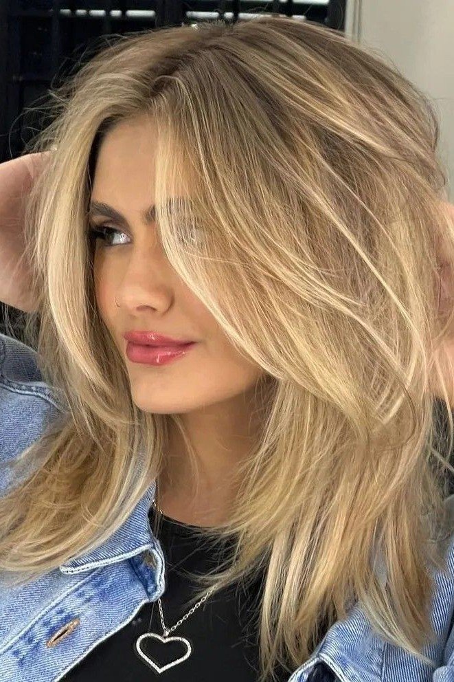 Choppy Blonde Shag with Curtain Bangs