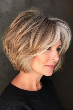 Dimensional Blonde Textured Bob with Side-Swept Layers