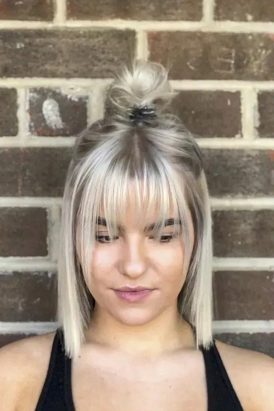 Half-Up Top Knot with Blunt Fringe