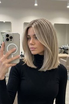 Layered Lob with Face-Framing Curtain Bangs