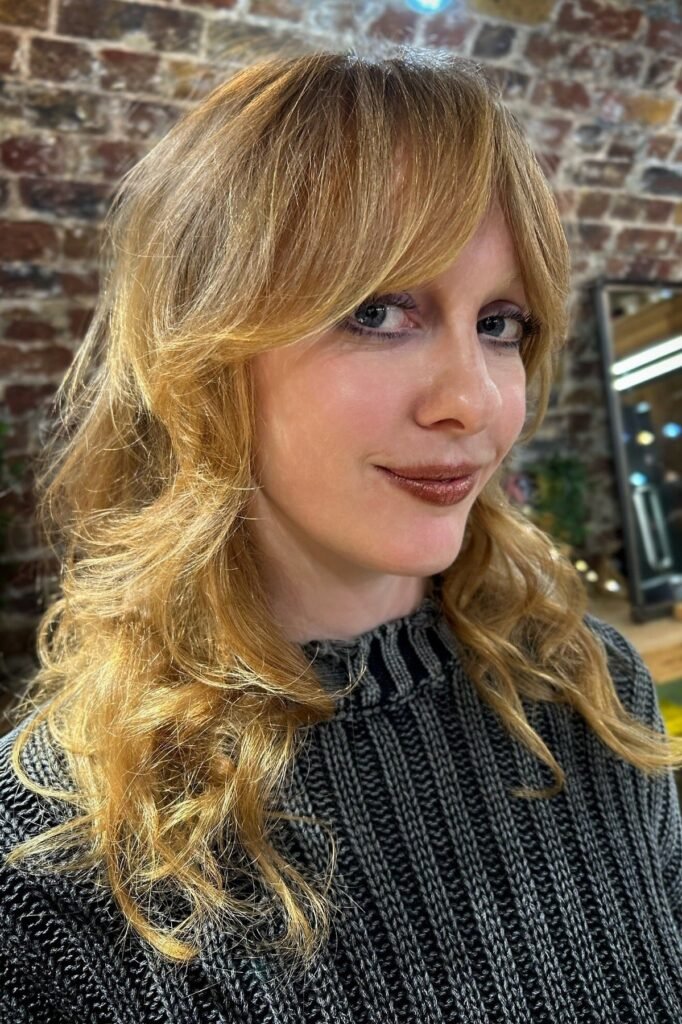 Layered Medium-Length Cut with Soft Bangs