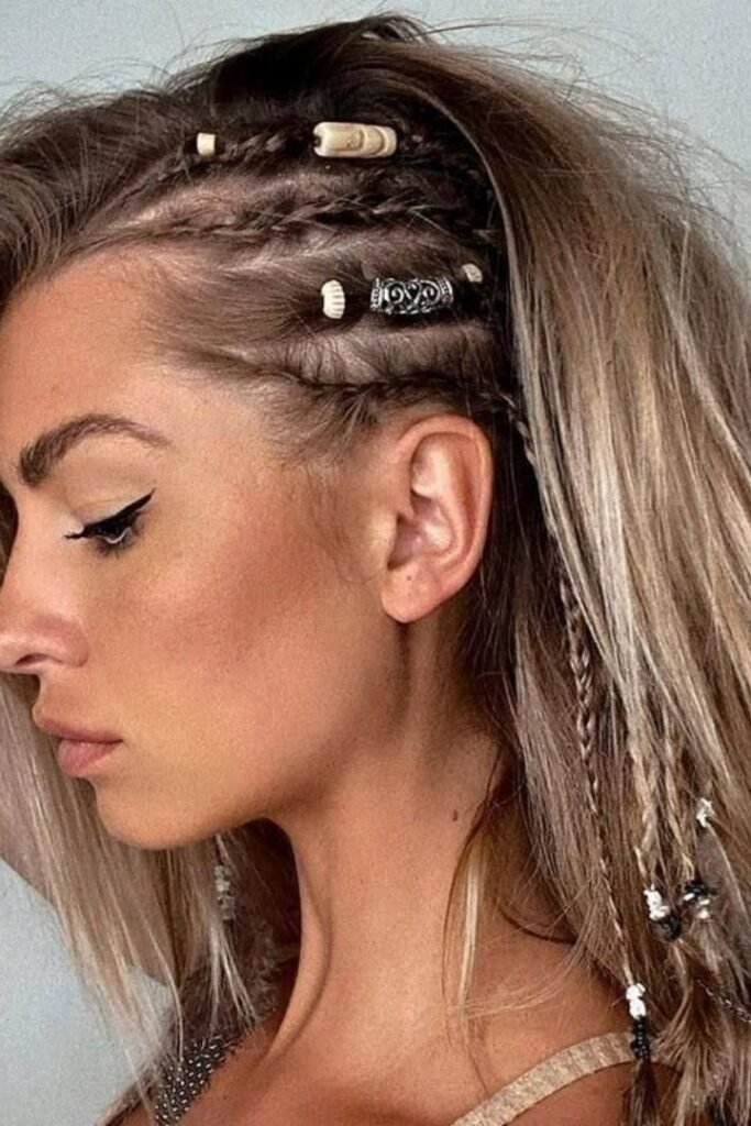 Layered Wavy Hair with Accented Braids and Hair Cuffs