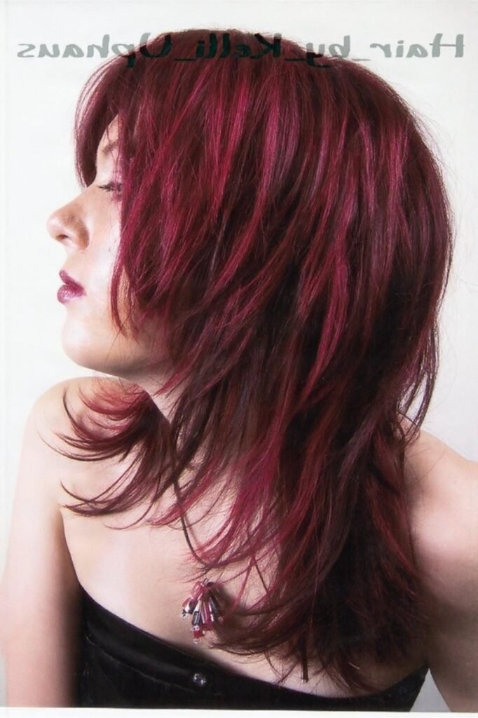 Medium Length Shag with Vivid Magenta Highlights