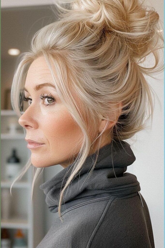 Messy High Bun with Soft Curtain Bangs
