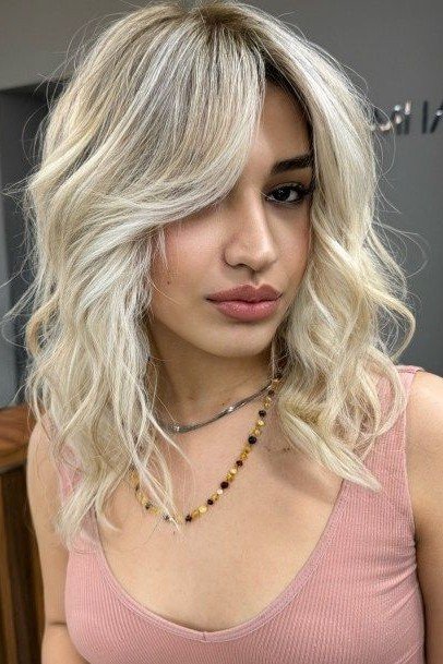 Platinum Blonde Shag with Curtain Bangs