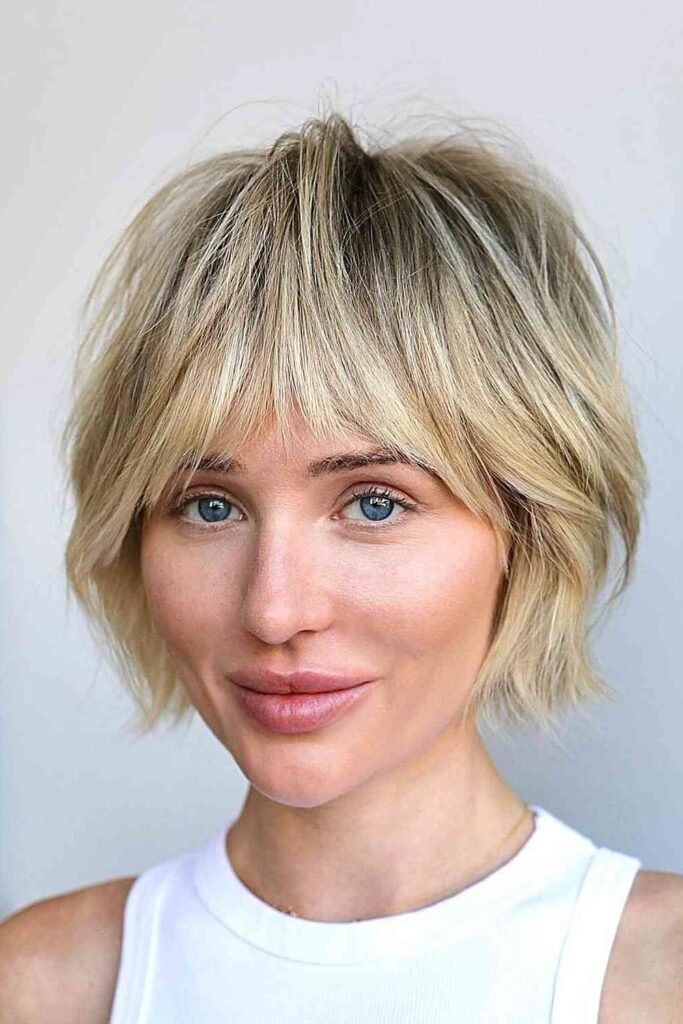 Shaggy Blonde Bob with Straight Bangs