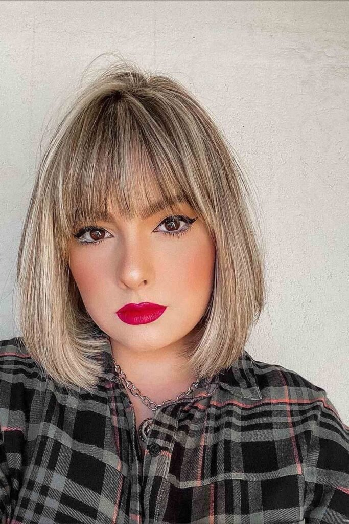 Sleek Blonde Bob with Blunt Bangs
