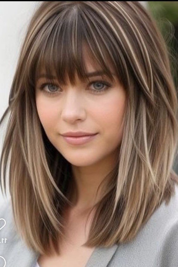 Sleek Layered Bob with Subtle Highlights and Bangs