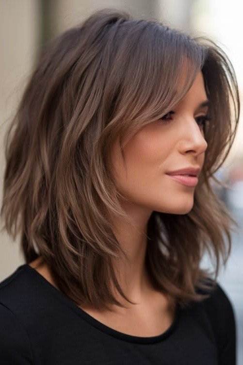 Soft Brown Layered Cut with Subtle Face-Framing Layers