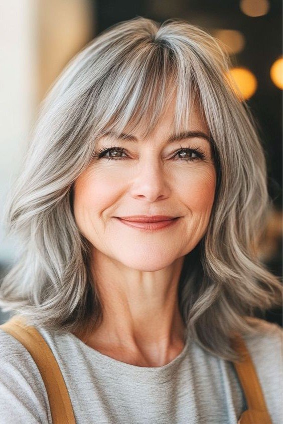 Soft Layered Mid-Length Cut with Feathered Curtain Bangs