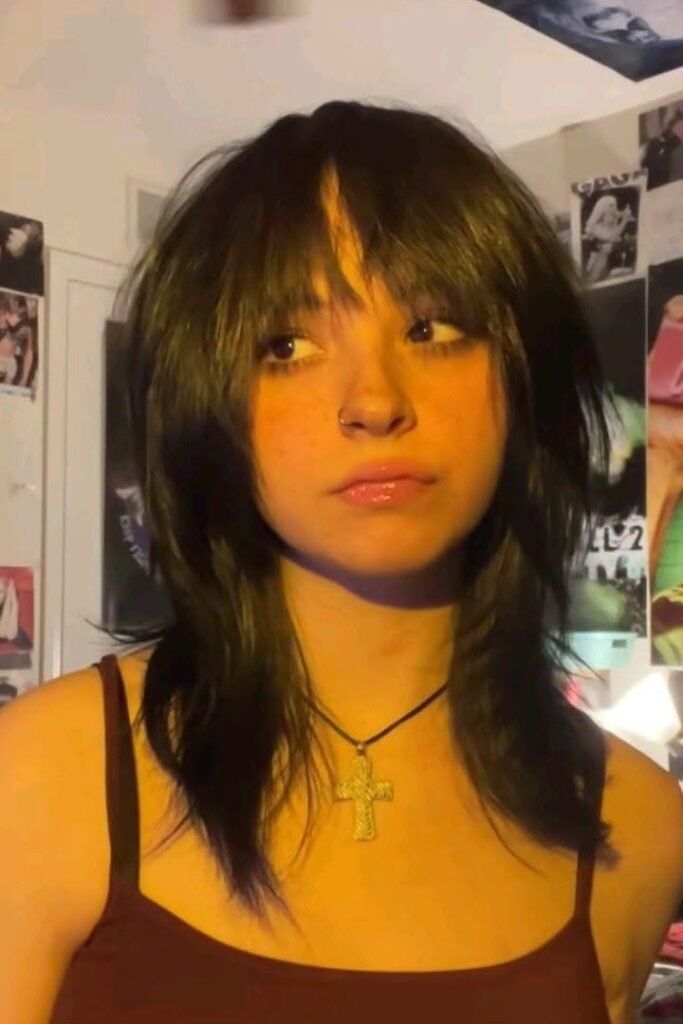 Soft Shag Haircut with Parted Curtain Bangs