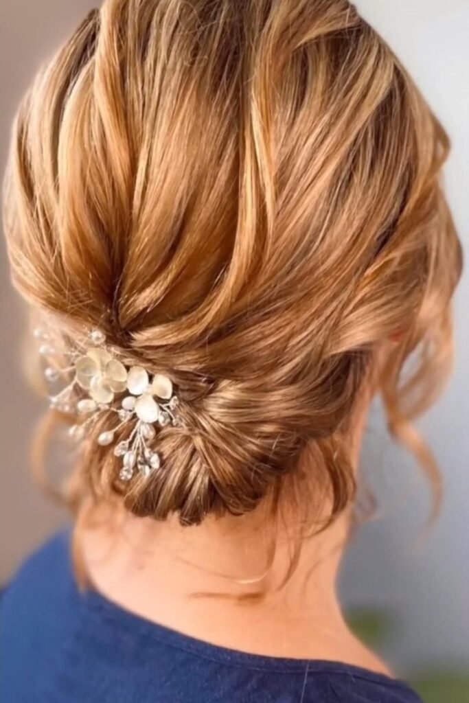 Textured Low Chignon with Floral Hair Comb