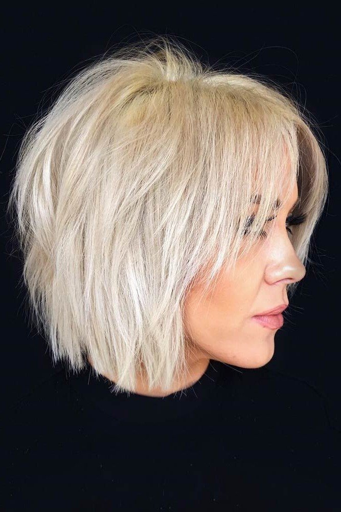 Textured Platinum Blonde Bob with Curtain Bangs