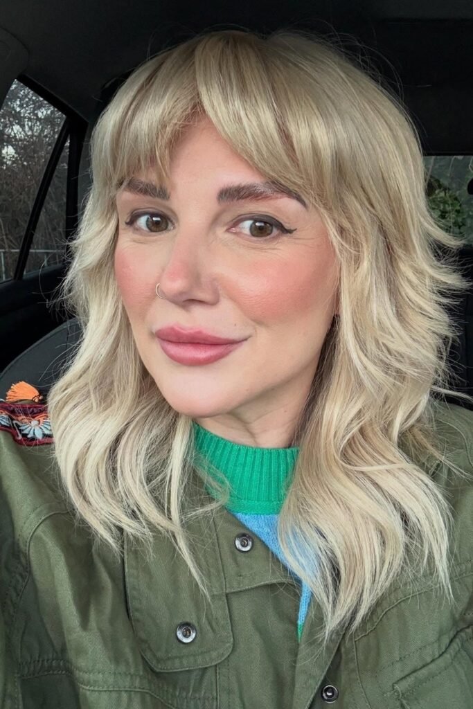 Textured Shag Hairstyle with Curtain Bangs