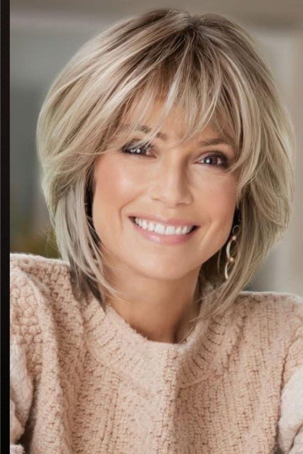 Wispy Layered Blonde Bob with Feathered Fringe