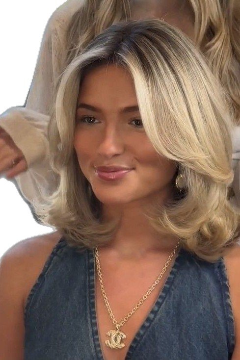 Ash Blonde Mid-Length Layered Hair with Curtain Bangs