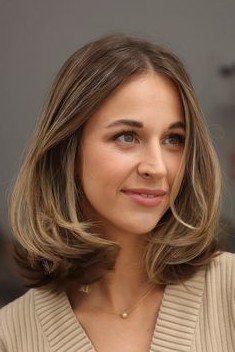 Classic Mid-Length Layered Cut with Subtle Highlights