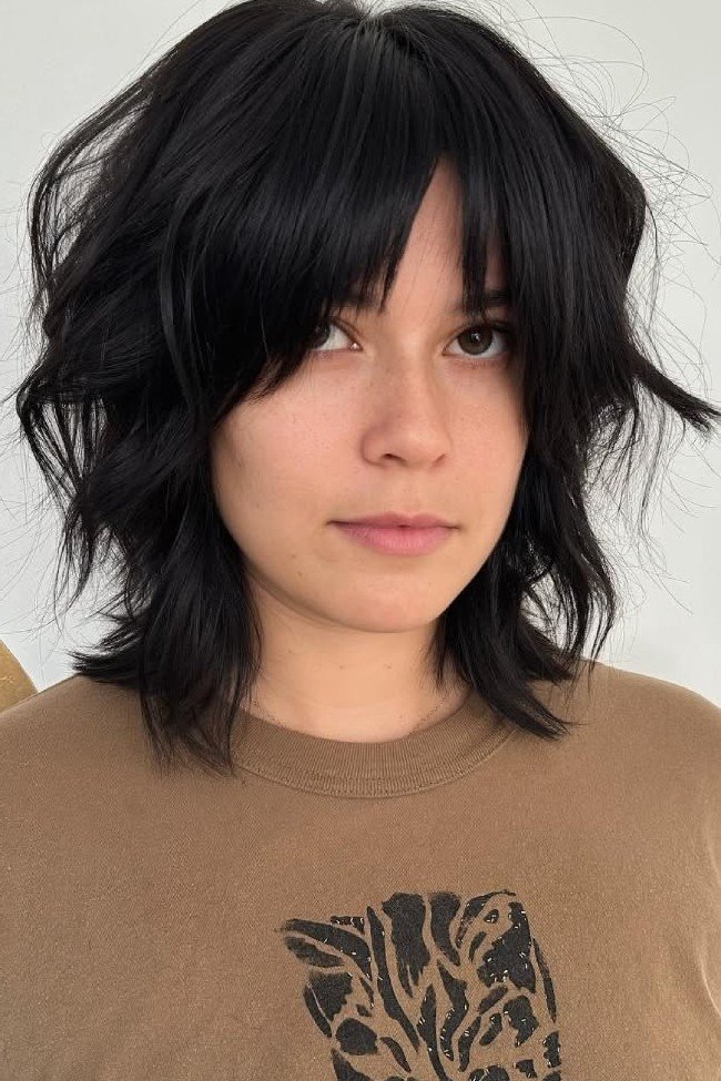 Dark Black Shaggy Layered Cut with Bangs