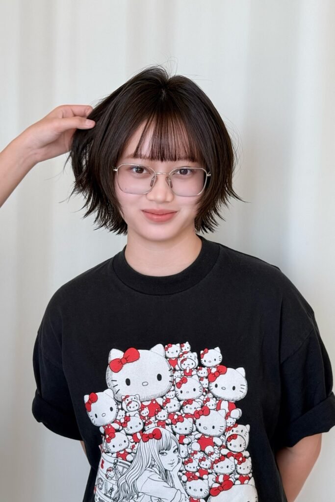 Dark Bob with Piece-Y Texture and Straight Bangs