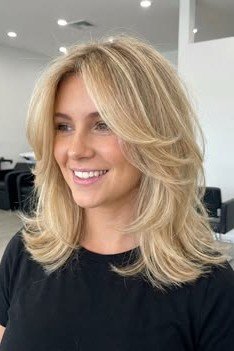 Dimensional Blonde Cut with Curtain Bangs