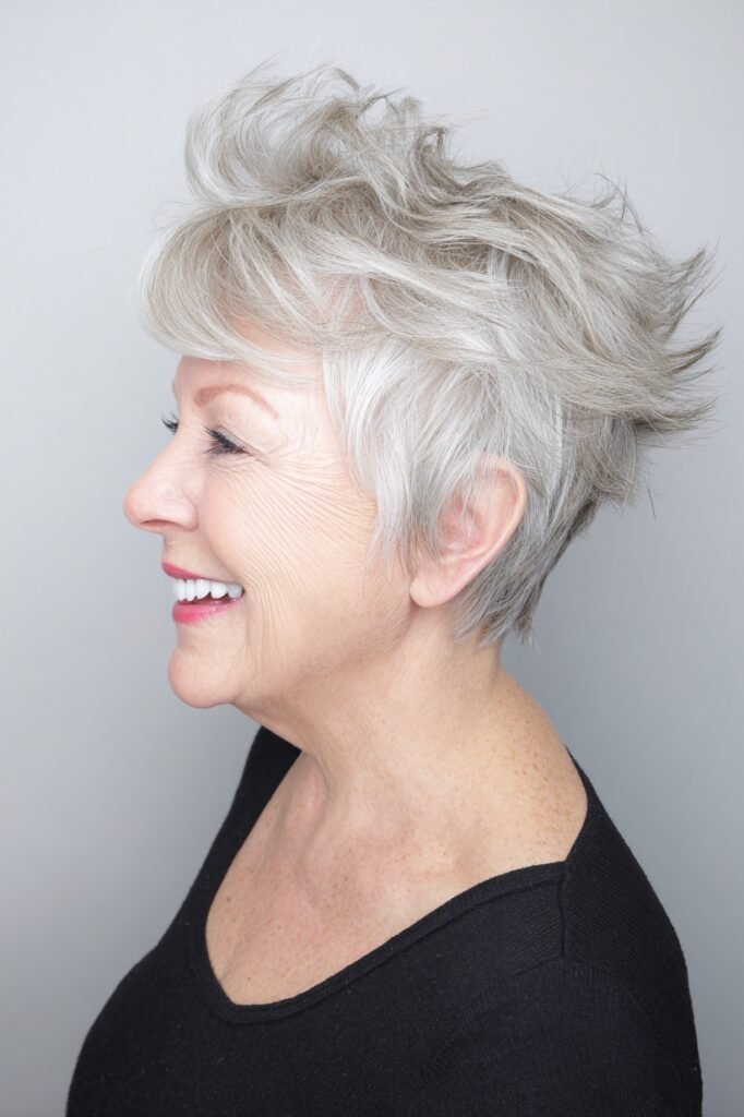 Feathered Silver Pixie Cut with Side-Swept Volume