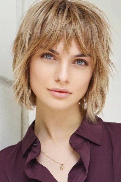 Golden Blonde Shaggy Layered Bob with Soft Bangs