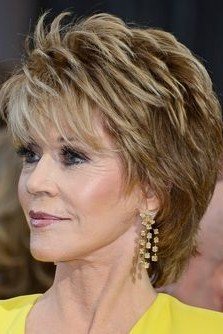 Layered Blonde Shaggy Bob with Side-Swept Bangs