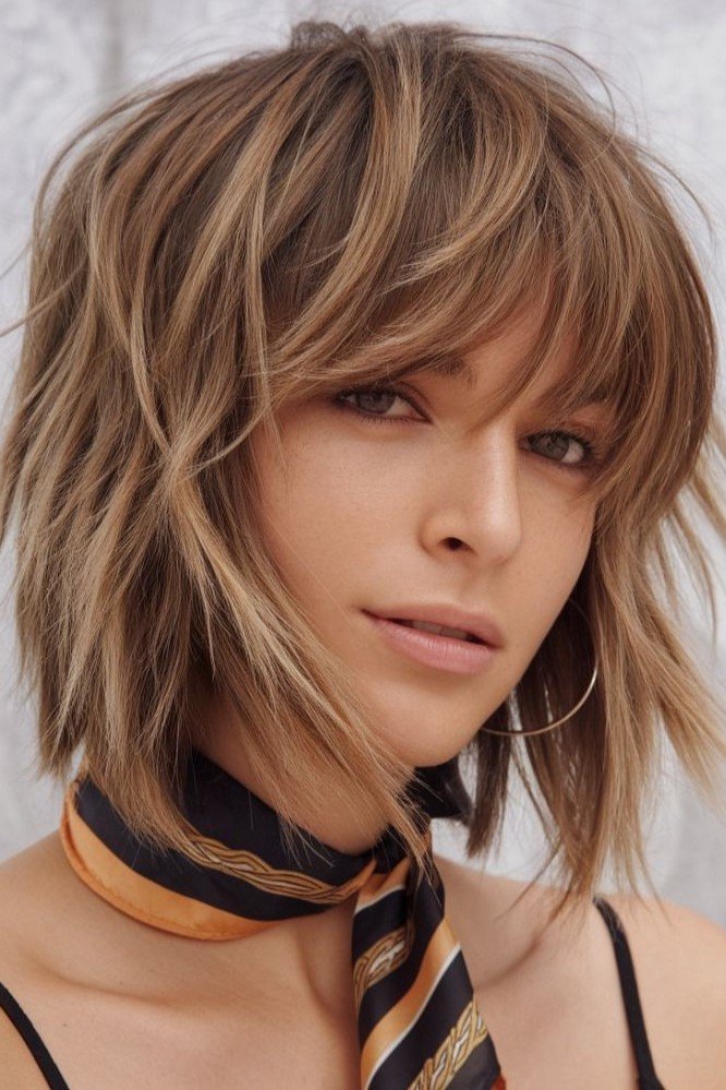 Layered Shaggy Bob with Face-Framing Bangs