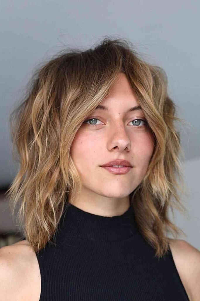 Layered Shoulder-Length Shag with Curtain Bangs