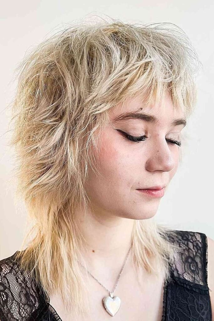 Light Blonde Textured Shag Haircut with Choppy Layers
