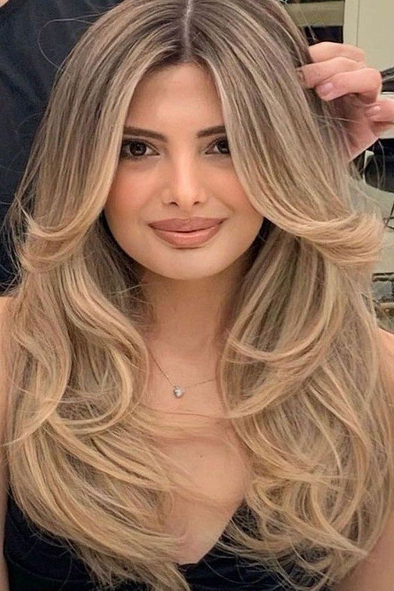 Long Layered Hair with Face-Framing Blonde Highlights