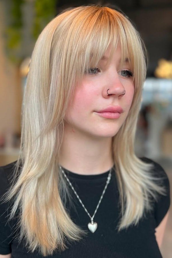 Long Layered Hair with Face-Framing Curled Ends