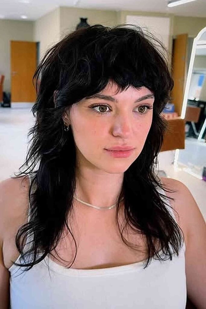 Long Shaggy Black Haircut with Choppy Layers