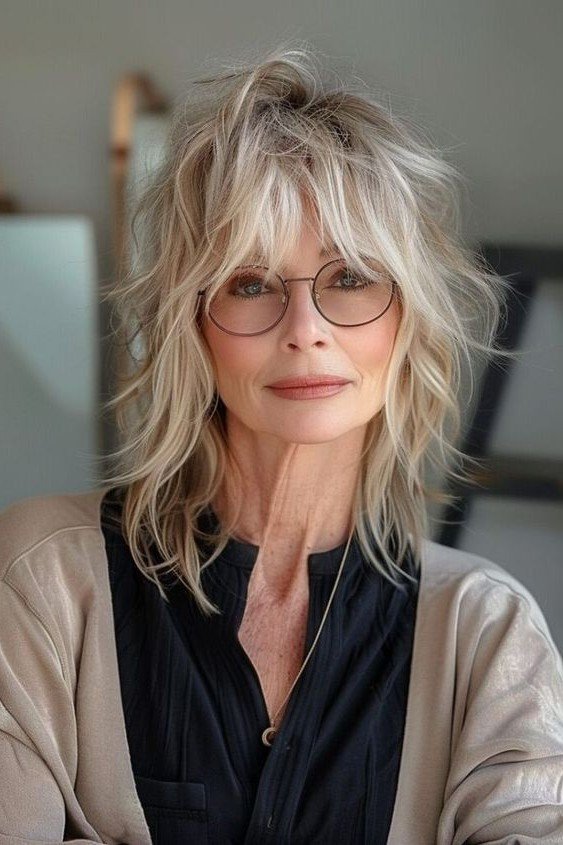 Messy Layered Shag with Feathered Bangs and Light Blonde Tones