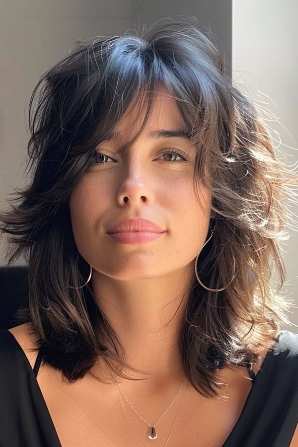 Mid-Length Shaggy Cut with Soft Curtain Bangs