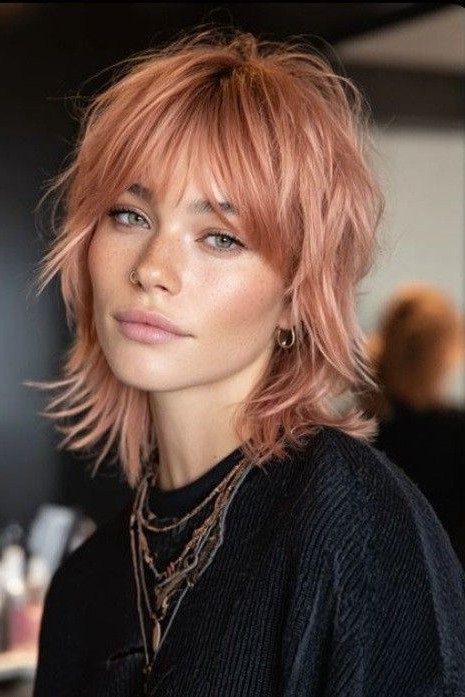 Peachy Blonde Shag Haircut with Face-Framing Layers