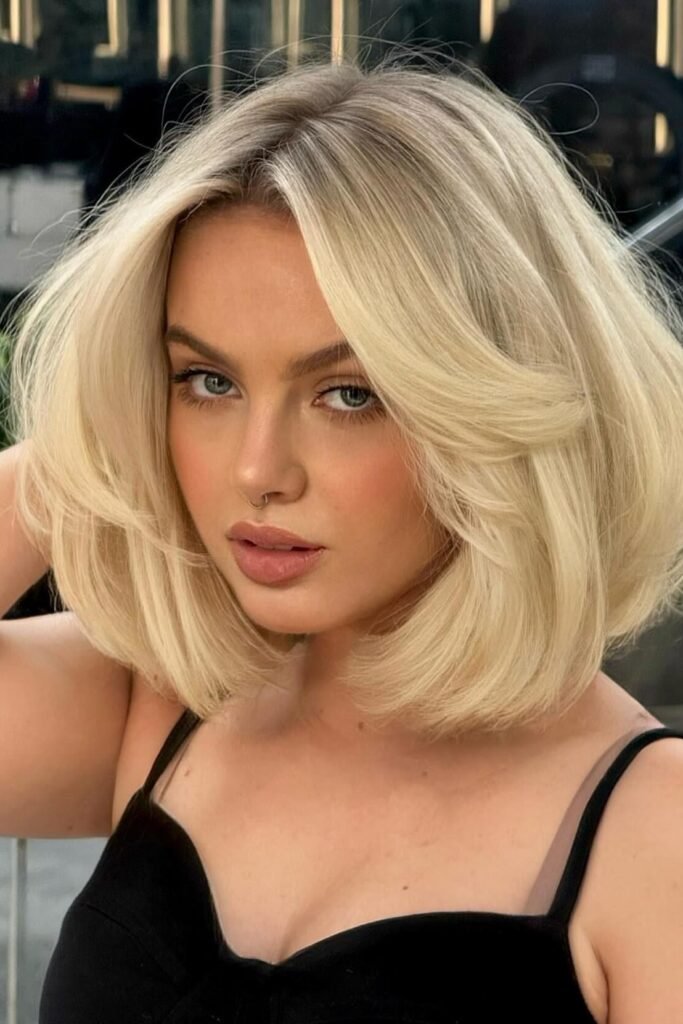 Platinum Blonde Rounded Bob with Voluminous Layers