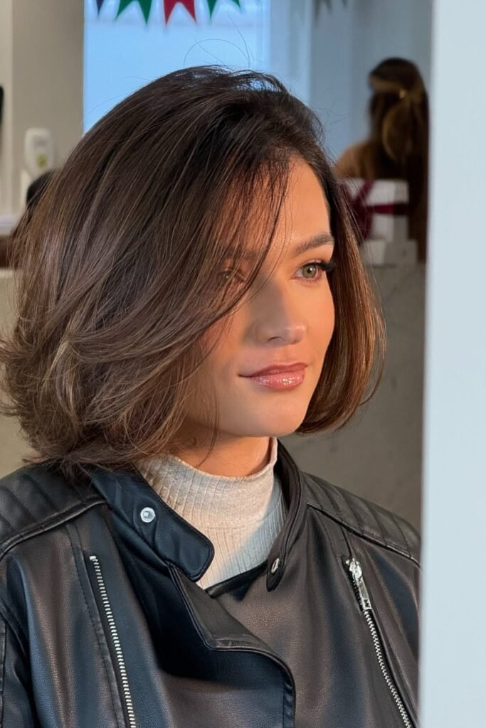 Polished Bob with Side-Swept Curtain Bangs