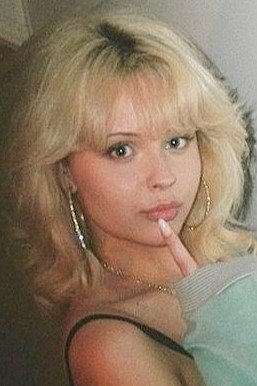 Retro Blonde Shag with Feathered Bangs