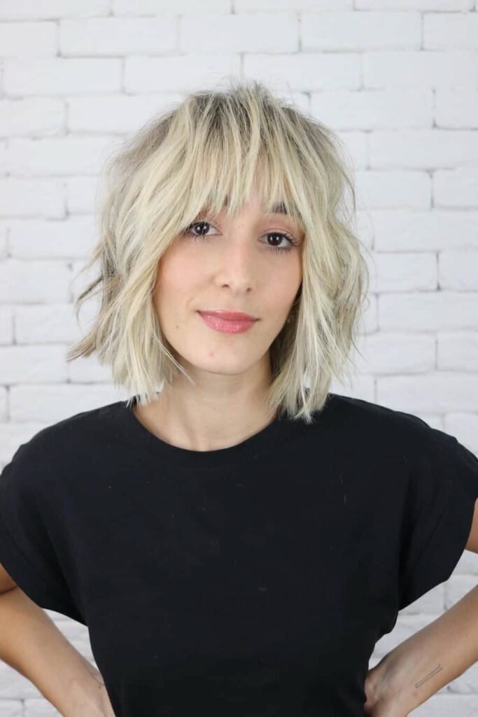 Shaggy Blonde Bob with Layered Fringe