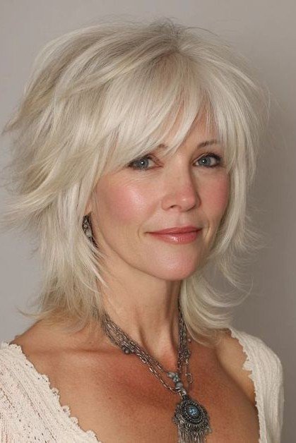 Shaggy Shoulder-Length Cut with Wispy Bangs