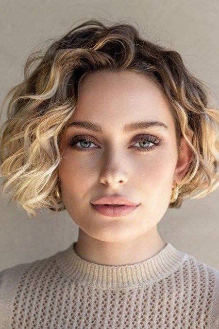Short Curly Bob with Blonde Highlights