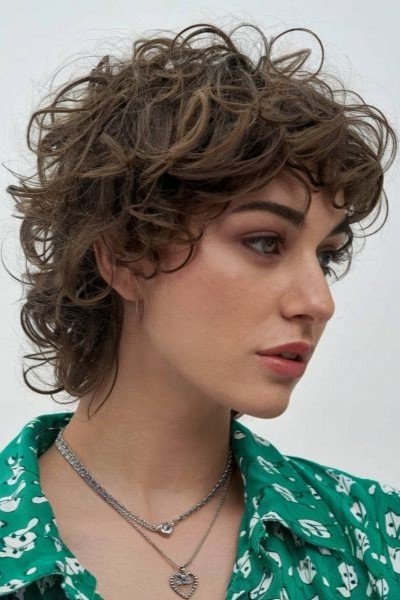 Short Curly Brown Shag Haircut with Textured Bangs