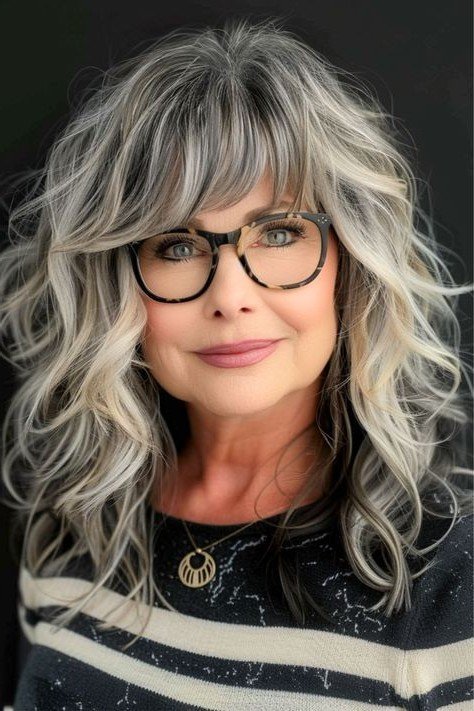 Shoulder-Length Layered Waves with Side-Swept Bangs and Glasses