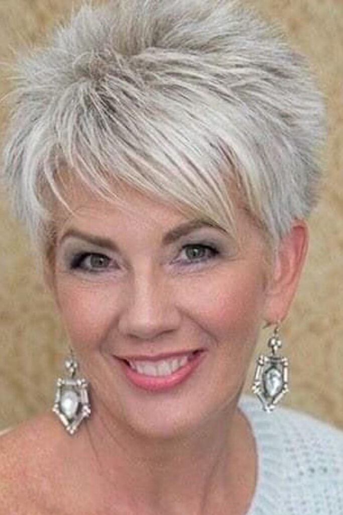 Silver Spiky Pixie Cut with Side-Swept Textured Bangs