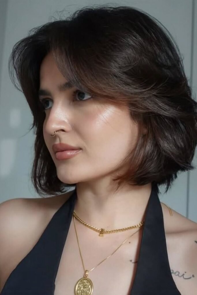 Sleek Medium-Length Bob with Side-Swept Layers