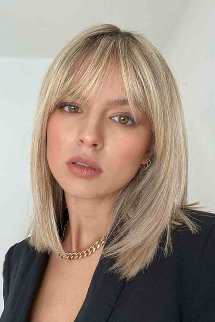 Sleek Mid-Length Bob with Curtain Bangs