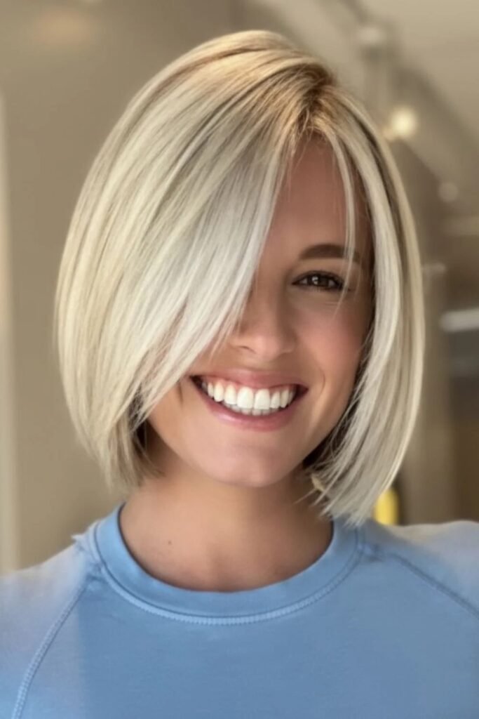Smooth Platinum Bob with Side-Swept Bangs