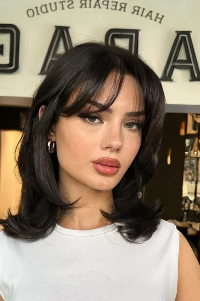 Soft Layered Bob with Curtain Bangs
